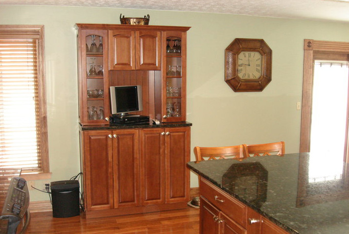 Blythe Construction for Transitional Kitchen with Wood Cabinets