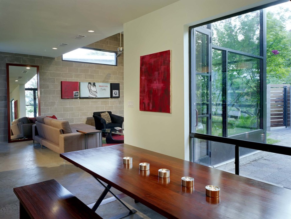 Cinder Block Retaining Wall for Industrial Dining Room with Open Floor Plan