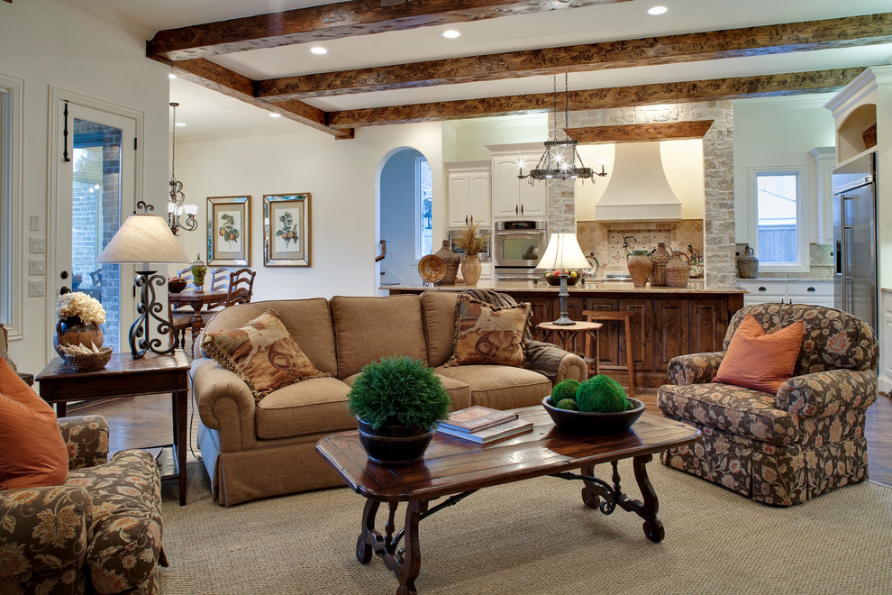 Duvet vs Comforter for Traditional Family Room with Ceiling Beams