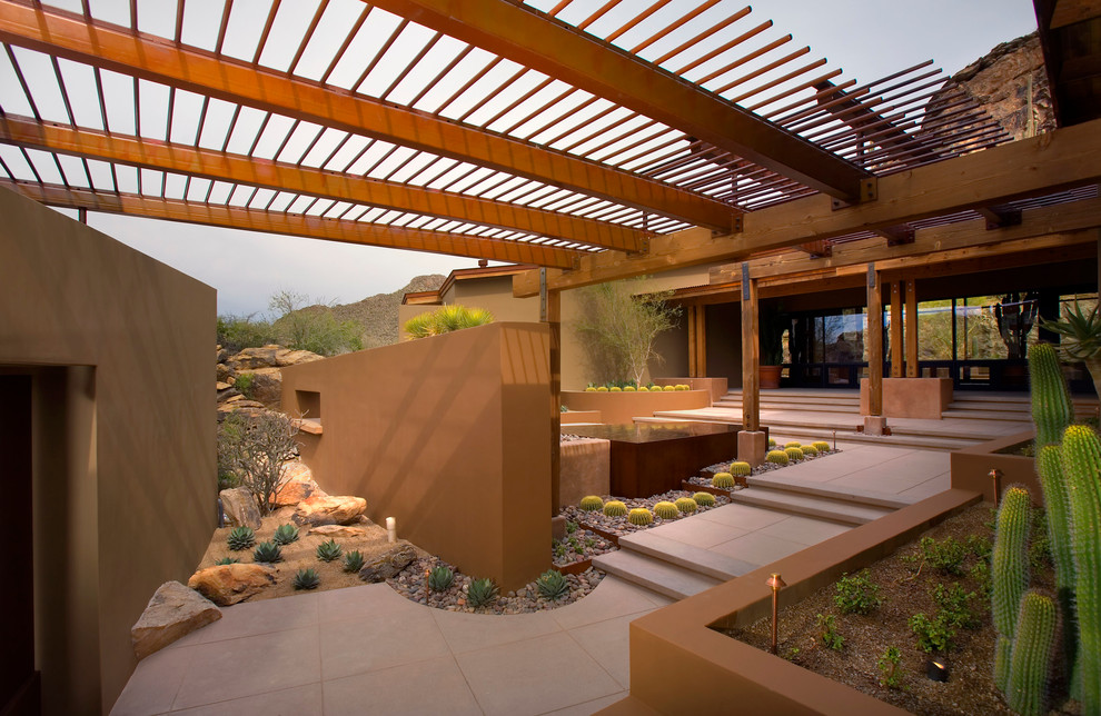 Exposed Aggregate Concrete for Southwestern Patio with Canopy