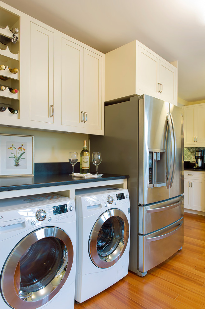 Gas Dryer vs Electric Dryer for Beach Style Kitchen with Black Counter