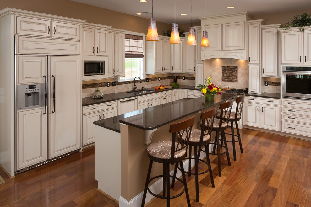 Glazing Kitchen Cabinets for Traditional Kitchen with Black Countertop