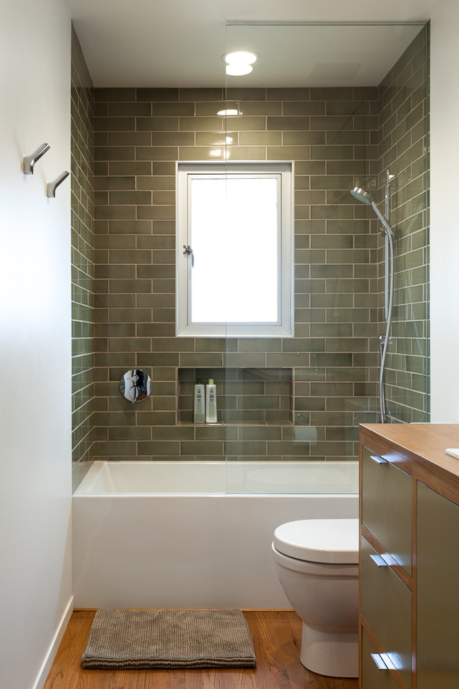 Hydrosystems for Midcentury Bathroom with Green Cabinets