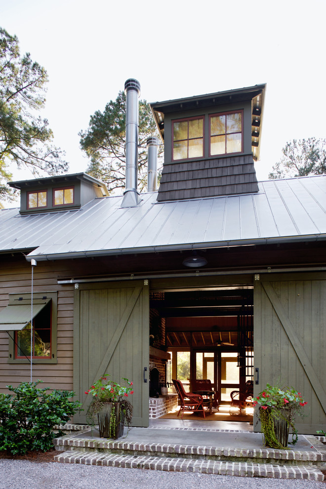 Mcelroy Metals for Rustic Exterior with Metal Chimney