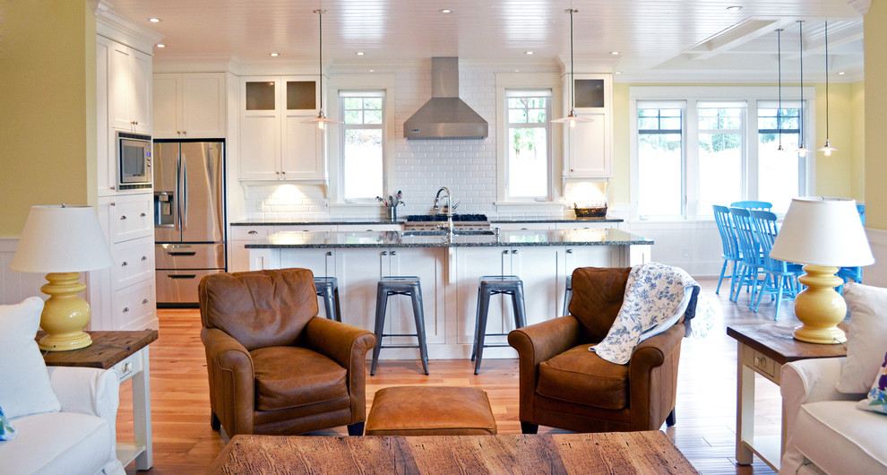 2x4 Subway Tile Kitchen Farmhouse with Blue Dining Chairs Built Ins