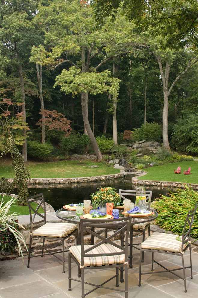 Backyard Koi Pond Landscape Traditional with Adirondack Chairs Boulders Bridge