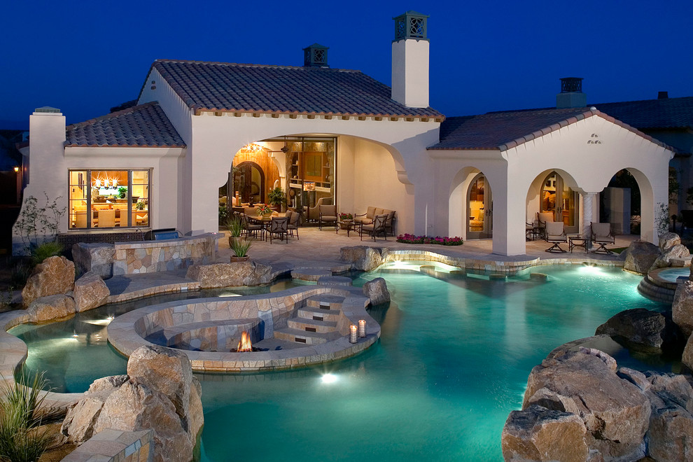 Backyard Pool Designs Pool Mediterranean with Boulders Covered Patio Exterior