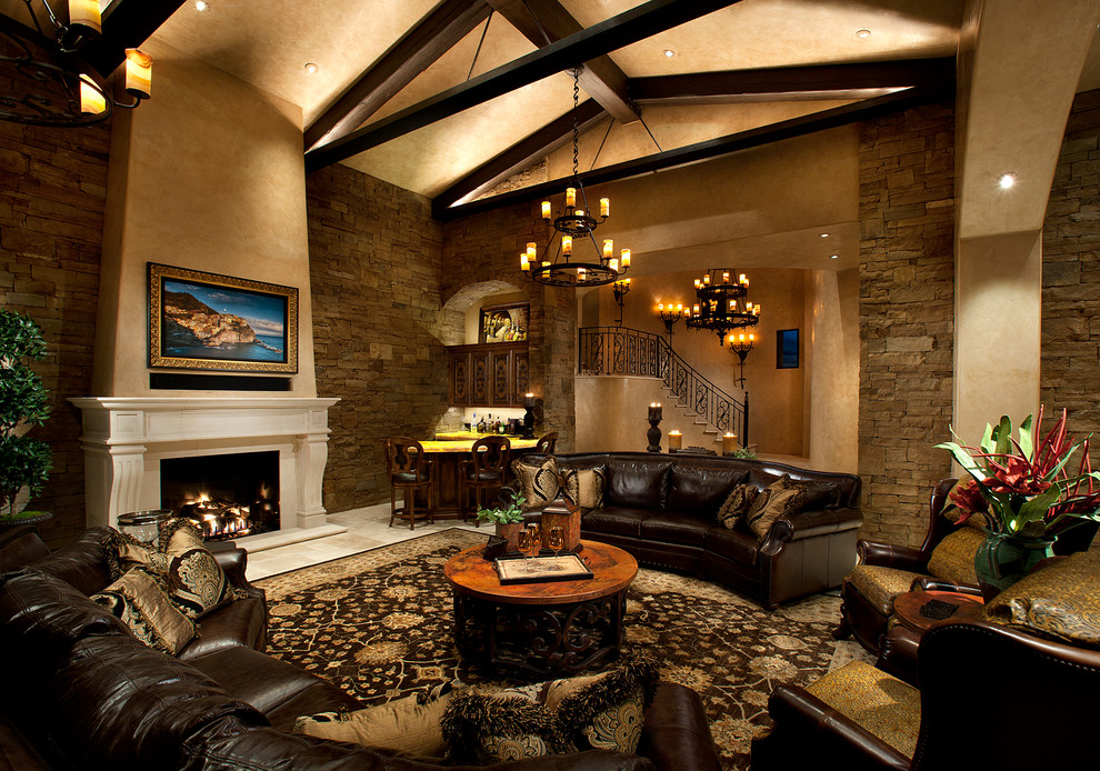 Black Leather Sectional Family Room Mediterranean with Beige Ceiling Beige Fireplace