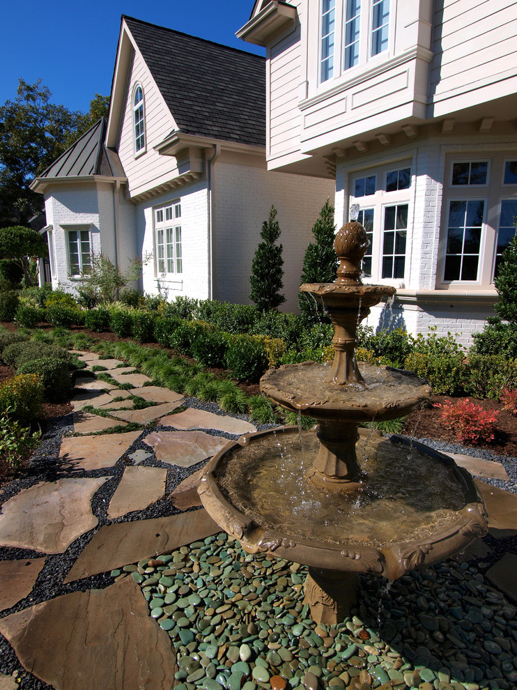 Black Pea Gravel Landscape Eclectic with Bay Window Flagstne Path