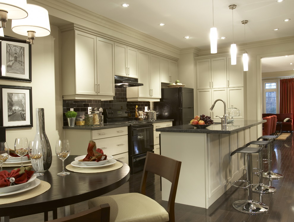 Black Tile Backsplash Kitchen Traditional with Black Appliances Breakfast Bar
