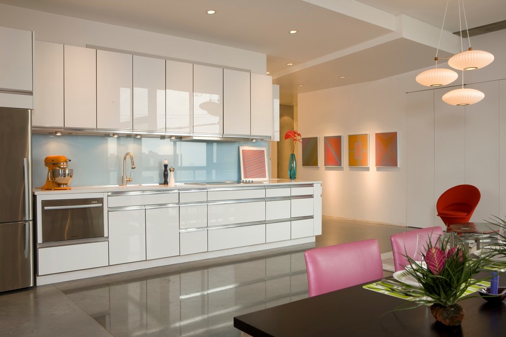 Blue Glass Backsplash Kitchen Modern with Artwork Concrete Floors Flush