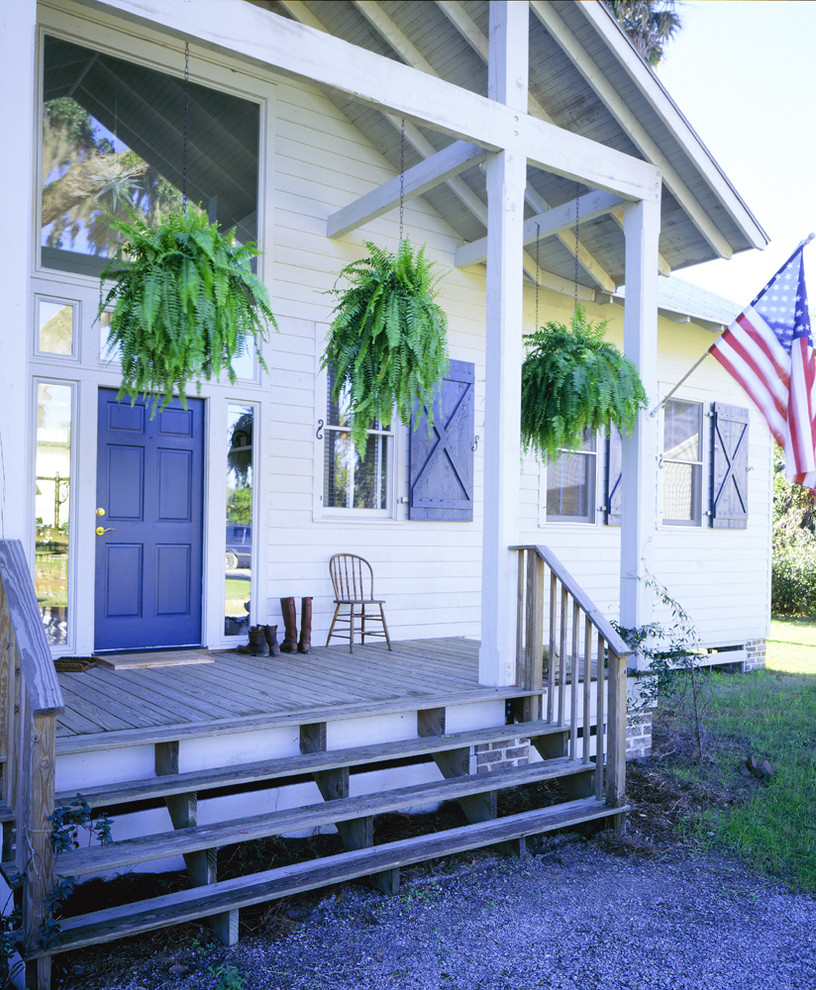 Board and Batten Shutters Exterior with Blue Trim Farmhouse Ferns