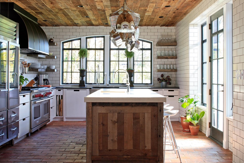Brick Floor Tile Kitchen Contemporary with Arched Window Black Range