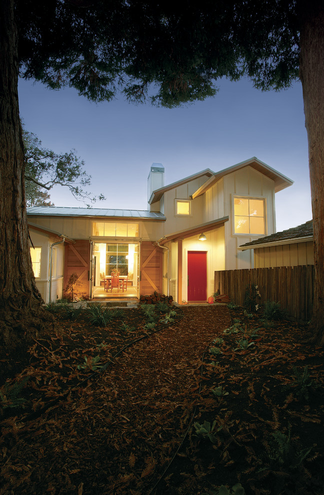 Build a Barn Door Exterior Farmhouse with Bark Mulch Barn Doors