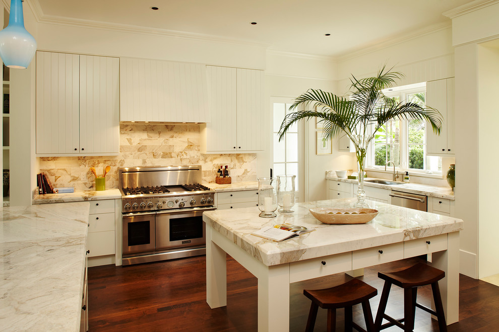 Calcutta Gold Marble Kitchen Traditional with Beige Backsplash Beige Cabinets