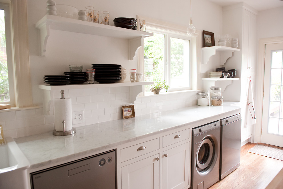 Carrera Marble Countertops Laundry Room Traditional with Bulb Pendant Light Carrera