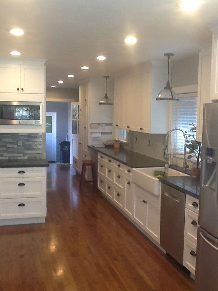 Concrete Floors in Homes Spaces Transitional with Black White Grey Kitchen