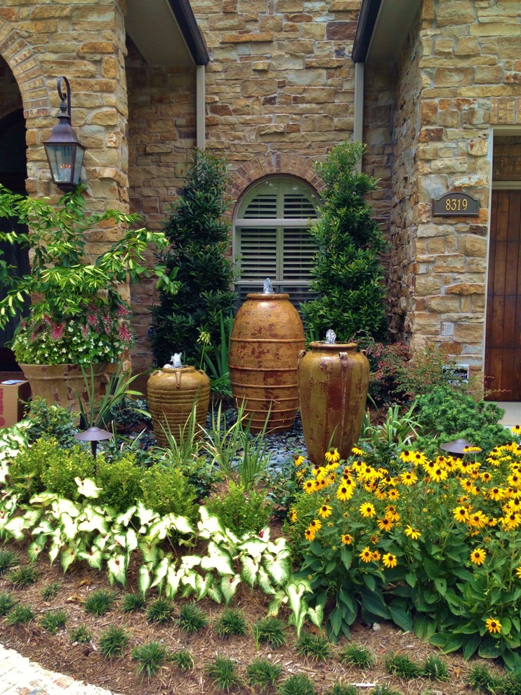 Contemporary Outdoor Fountains Landscape Mediterranean with Annuals Arch Window Bark