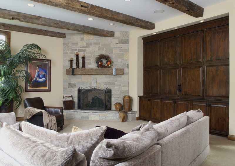 Corner Stone Fireplace Family Room Traditional with Beams Built Ins Stone