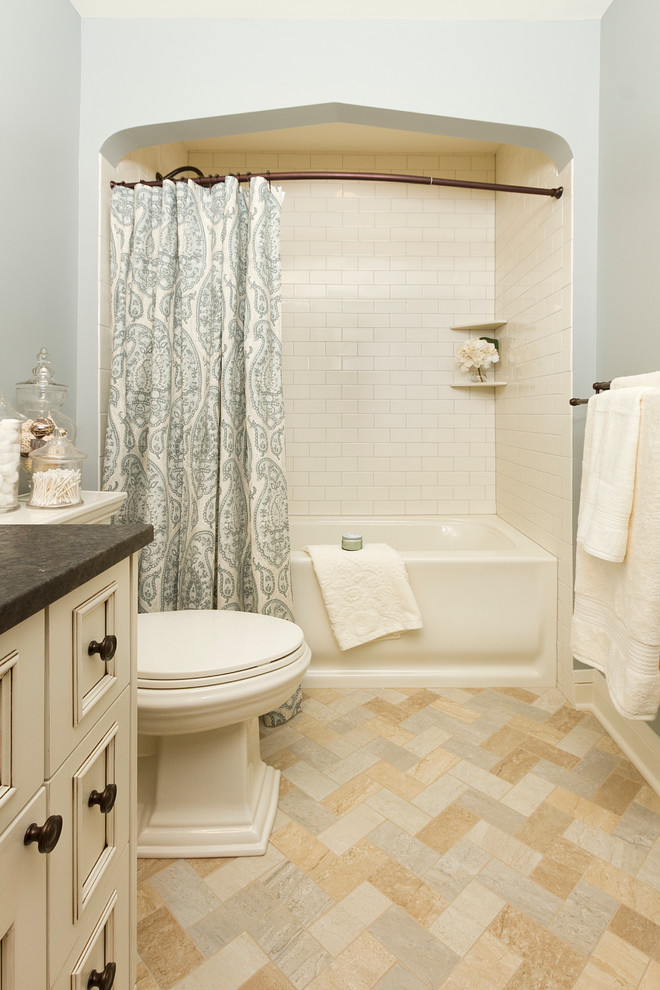 Cream Subway Tile Bathroom Traditional with Alcove Archway Jars Light1