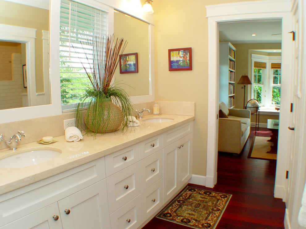 Crema Marfil Countertop Bathroom Tropical with Area Rug Hardwood Floor