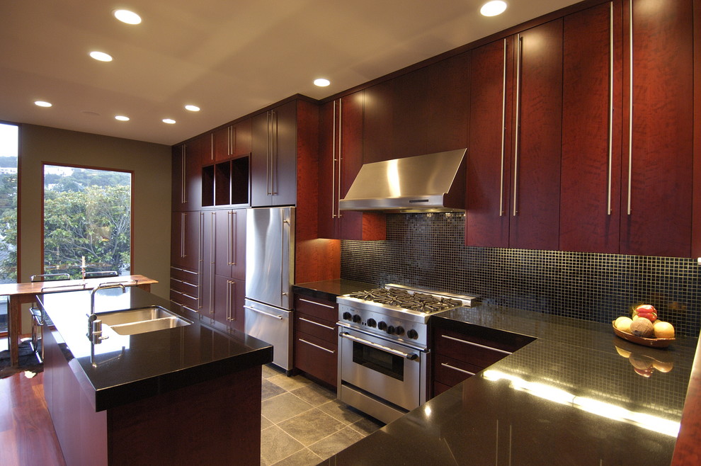 Dark Cherry Cabinets Kitchen Eclectic with Black Counters Eclectic Kitchen1