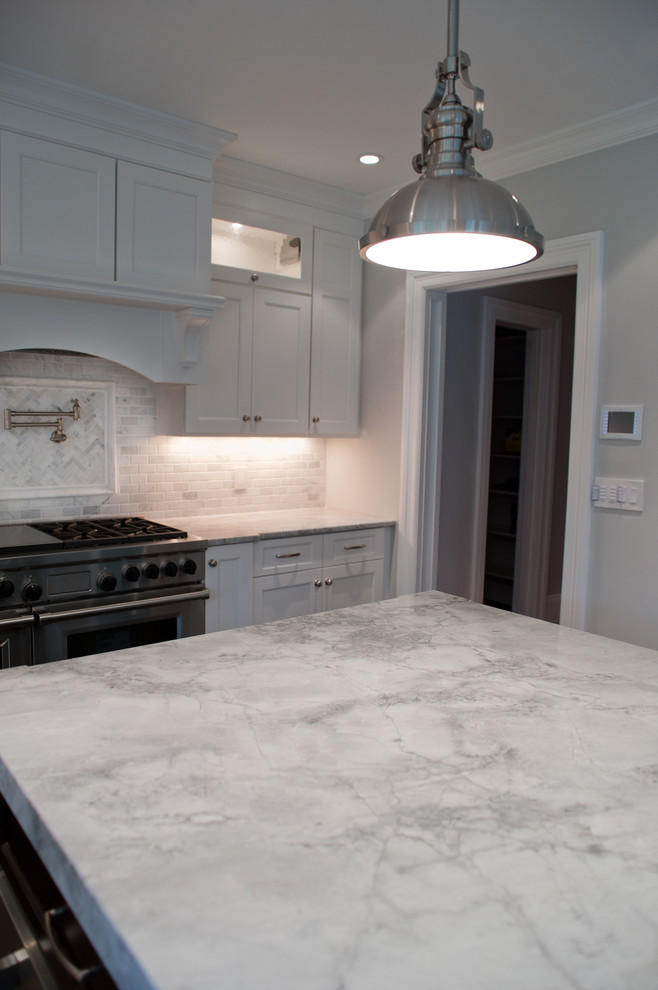 Fantasy White Granite Kitchen with Brushed Nickel Pendant Over