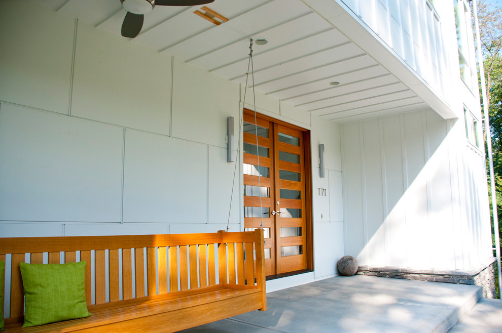 Farmhouse Front Door Porch Farmhouse with Board and Batten Covered