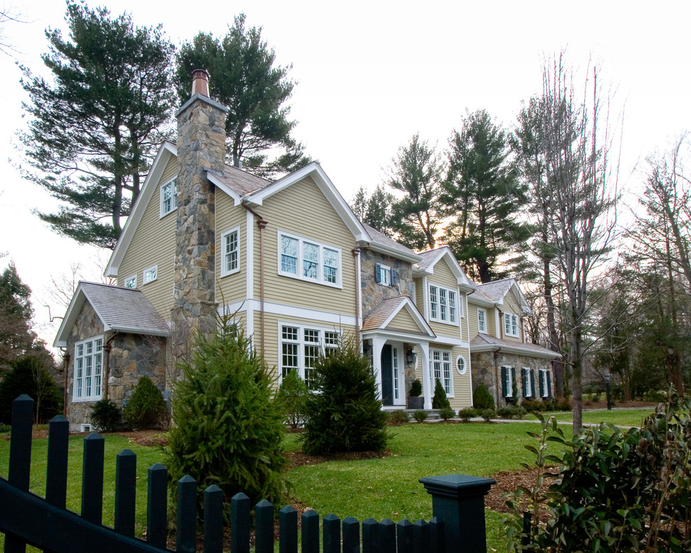 Faux Stone Siding Exterior Traditional with Circular Windows Colonial Copper