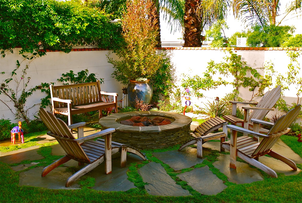 Fire Pit Stones Patio Beach with Adirondack Chairs Container Plants