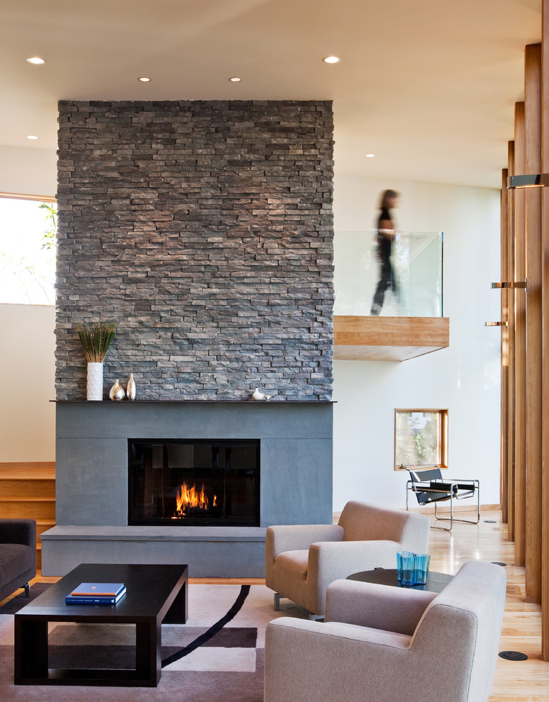 Fireplace Stacked Stone Living Room Contemporary with Armchair Black Coffee Table