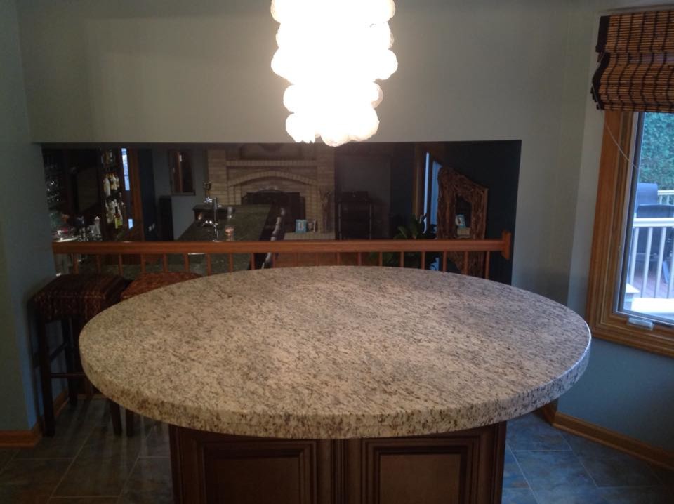 Giallo Ornamental Light Granite Kitchen with Cabinetry Dark Wood Cabinetry2
