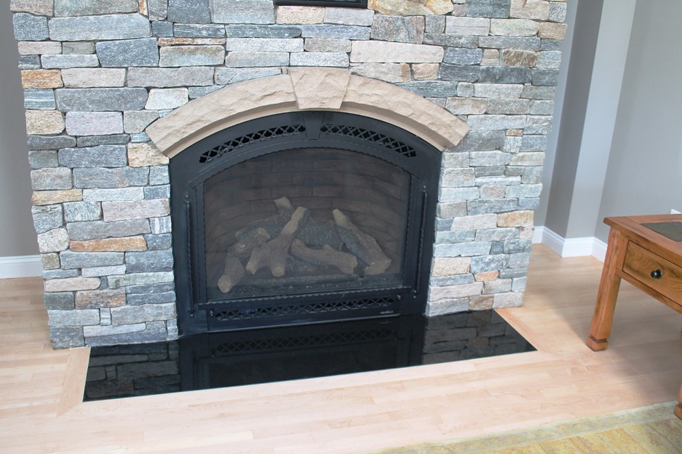 granite fireplace hearth Living Room Traditional with none