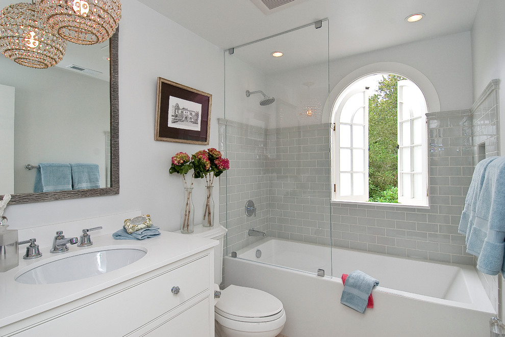 Gray Subway Tile Bathroom Traditional with Arched Window Crystal Chandelier