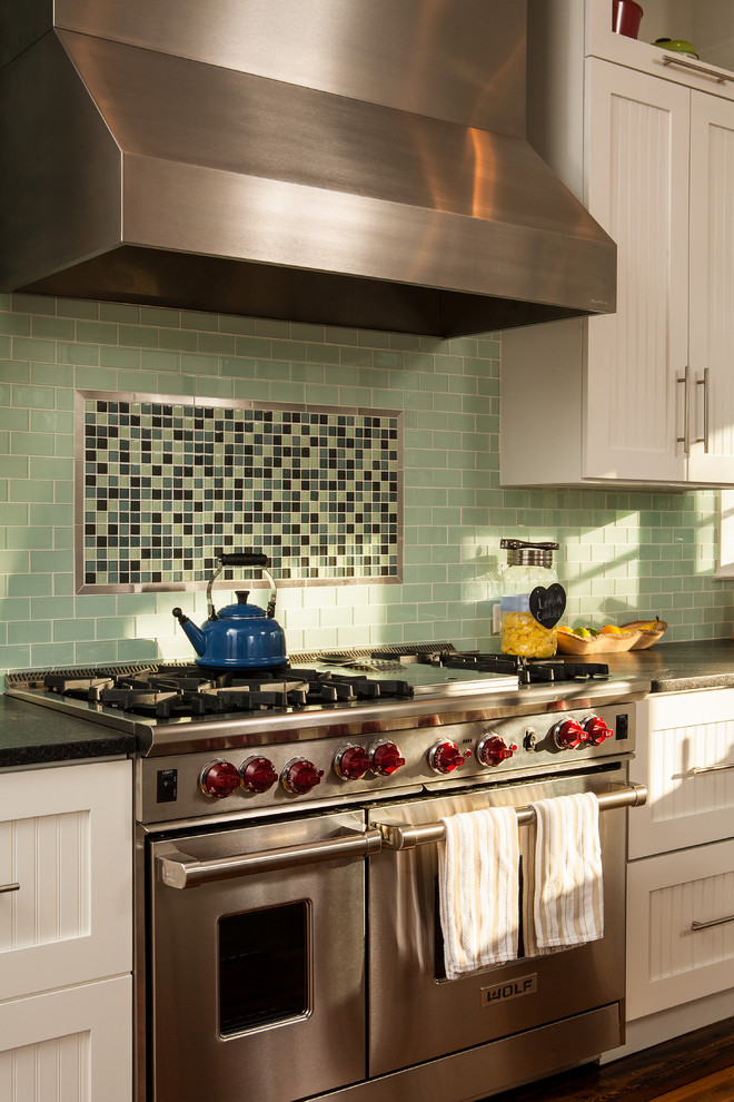 Green Glass Subway Tile Backsplash Kitchen Craftsman with Beadboard Cabinets Black Beauty