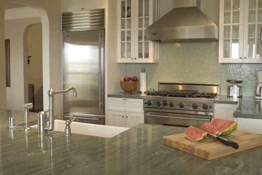 Green Granite Countertop Kitchen Traditional with Cabinets Chopping Board Cooktop1