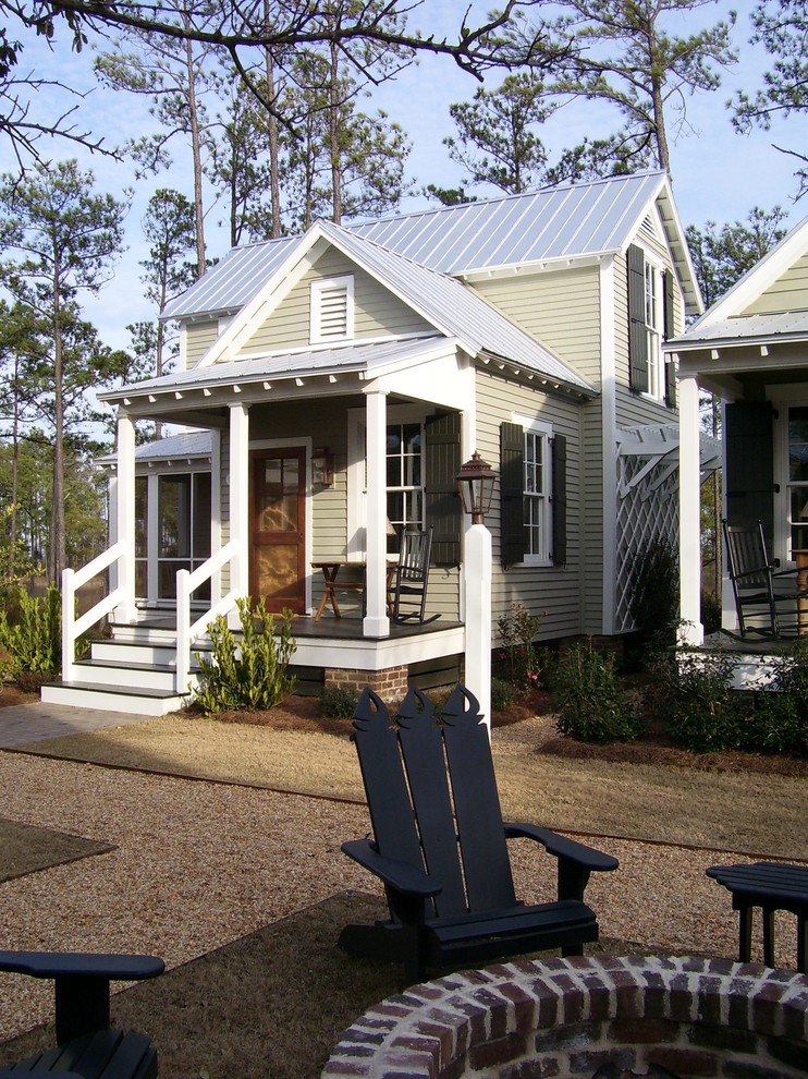 Green Tin Roof Exterior Farmhouse with Adirondack Chairs Black Shutters