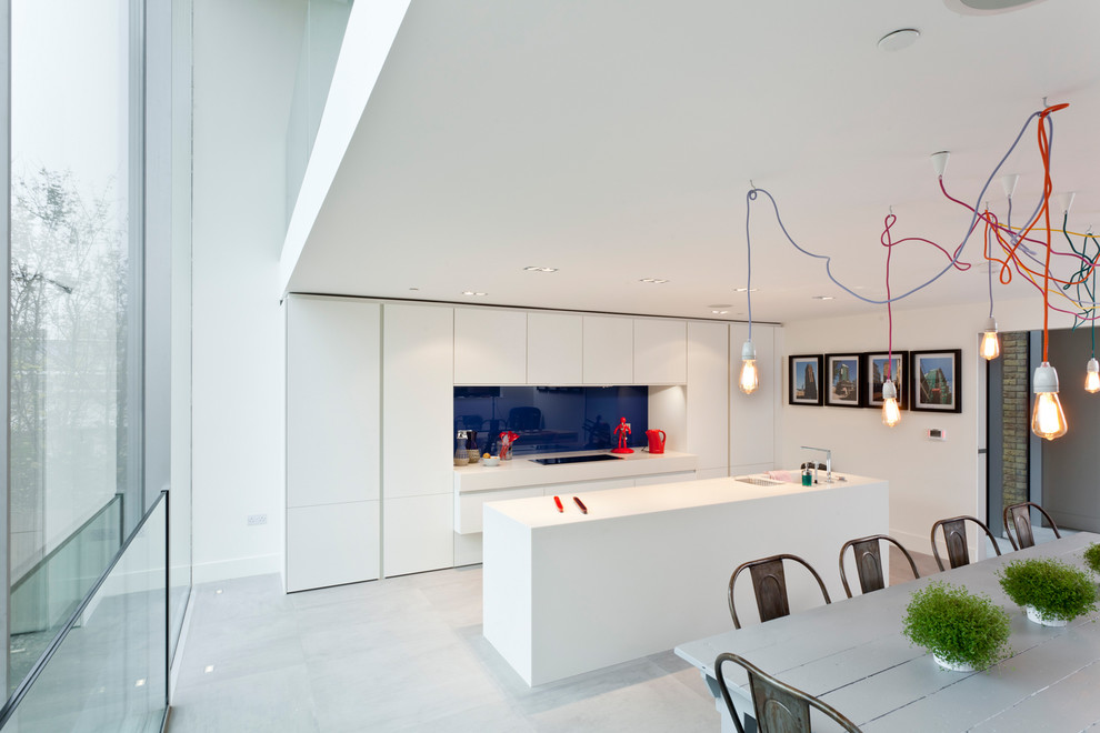 Hanging Light Bulbs Kitchen Contemporary with Blue Backsplash Cooktop Eat In