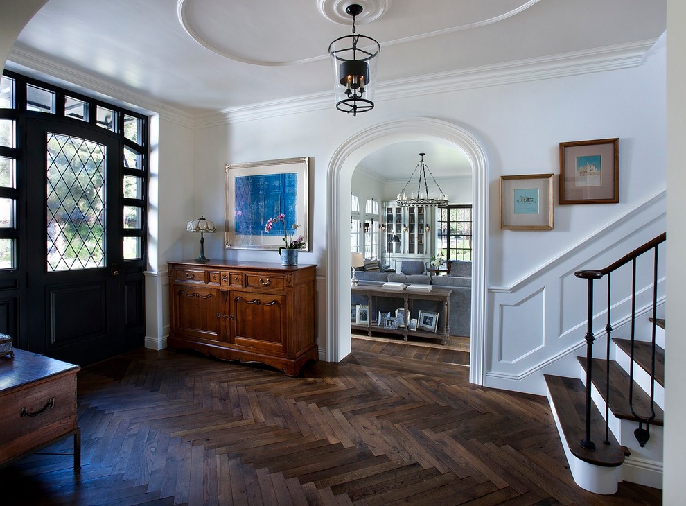 Herringbone Wood Floor Entry Traditional with Arch Arched Doorway Black