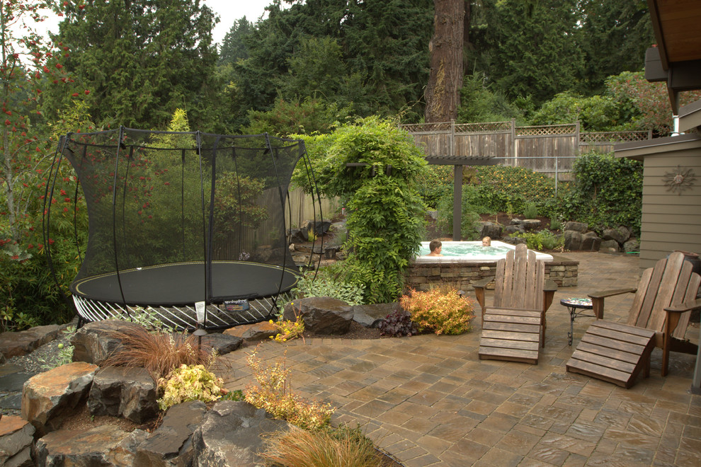 hot tub surround Patio Traditional with boulders built-in hot tub