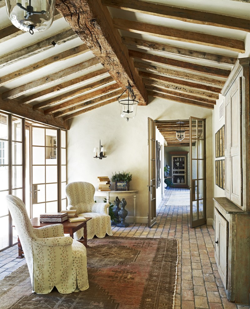 Interior Brick Flooring Family Room Mediterranean with Brick Floor Double Doors