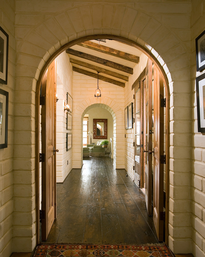 Interior Brick Flooring Hall Southwestern with Archway Brick Wall Dark