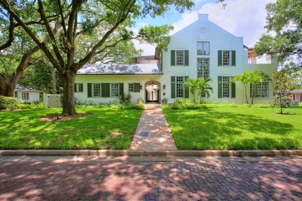 Iron Gates Design Exterior Tropical with Brick Brick Road Bright