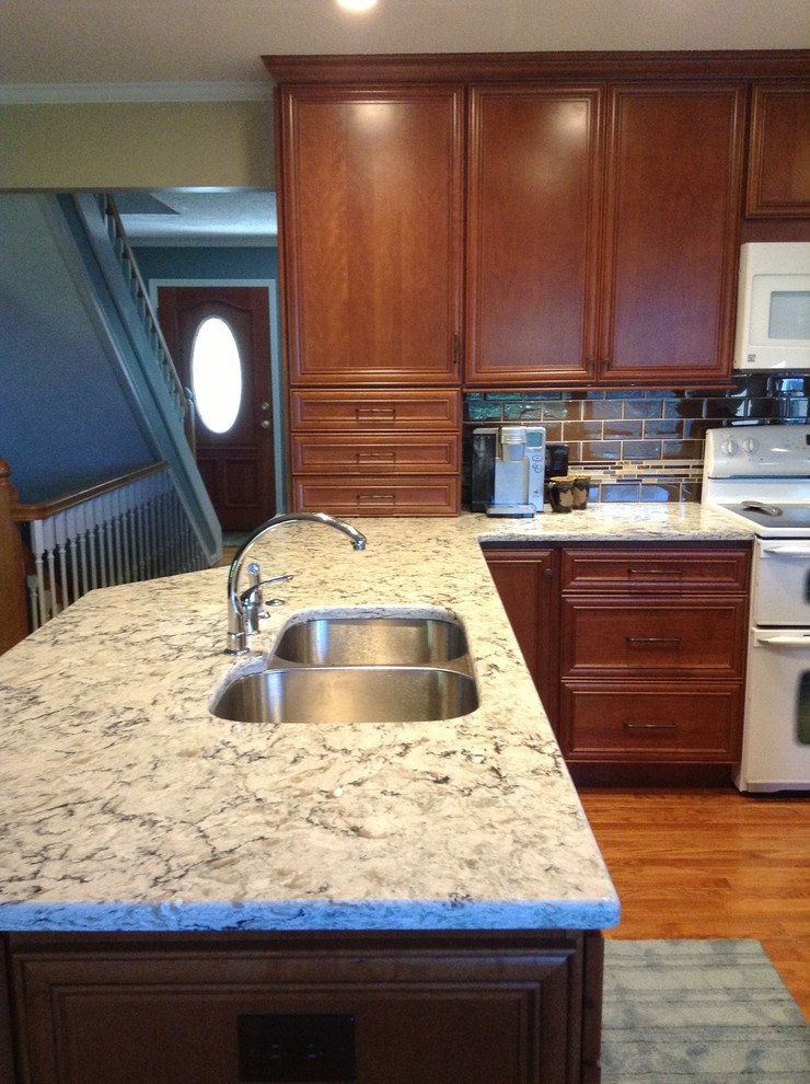 Jeffrey Alexander Hardware Kitchen Traditional with Brown Subway Tile Cambria