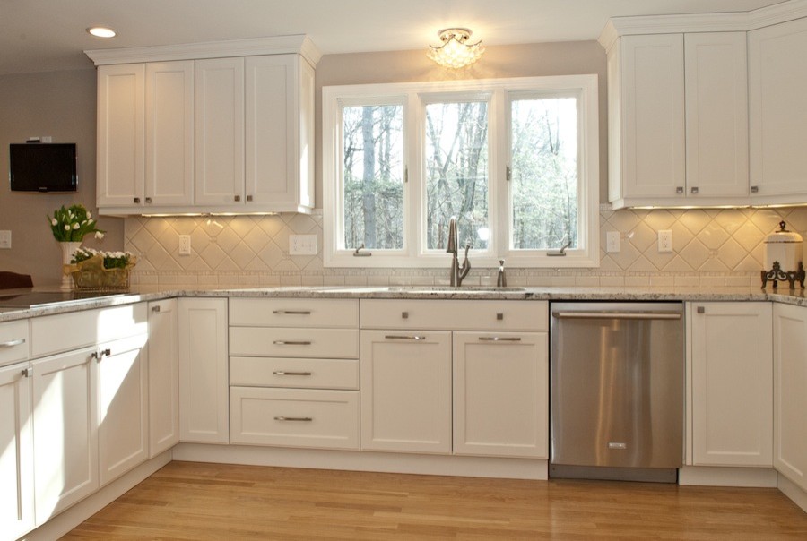 Kashmir White Granite Countertops Kitchen Traditional with Electrolux Appliances Hand Thrown Oak