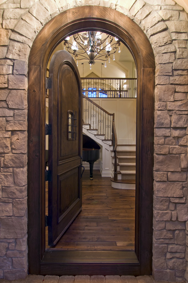 Knotty Alder Doors Entry Rustic with Arch Doorway Dark Floor