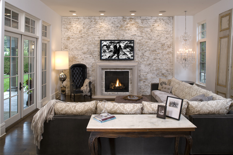 Leather and Cloth Sofas Family Room Mediterranean with Accent Wall Brick Fireplace