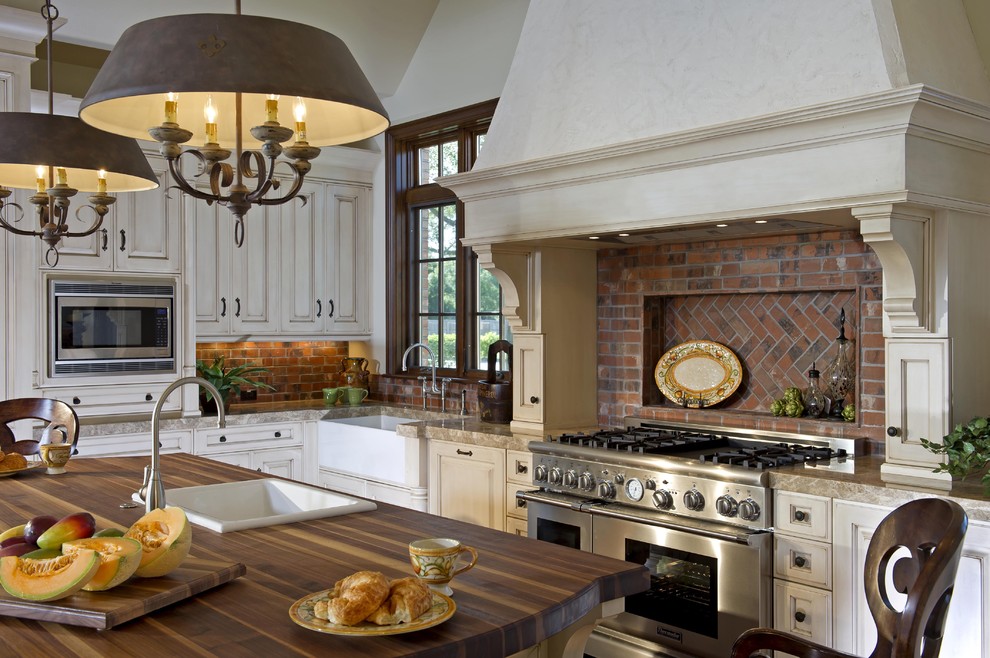 Light Emperador Marble Kitchen Traditional with Brick Backsplash Brick Wall