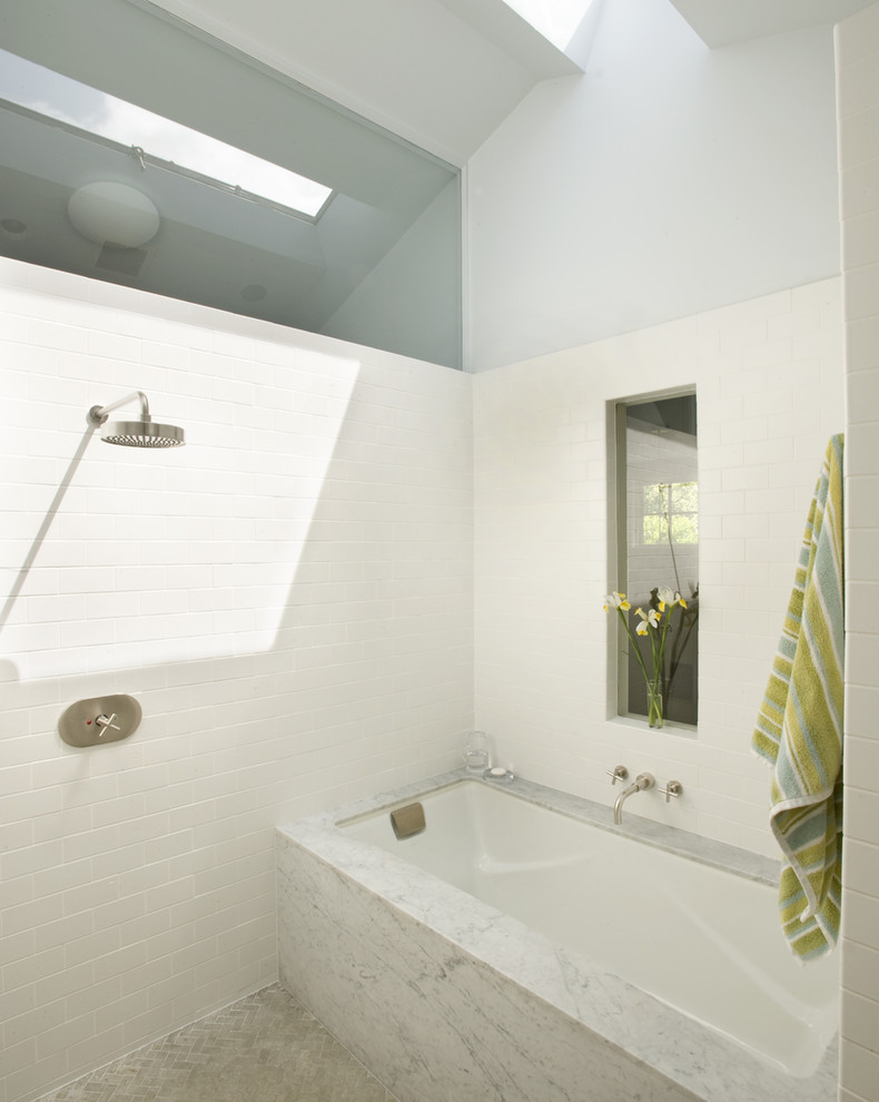 Matte White Subway Tile Bathroom Contemporary with Clerestory Herringbone Marble Tub
