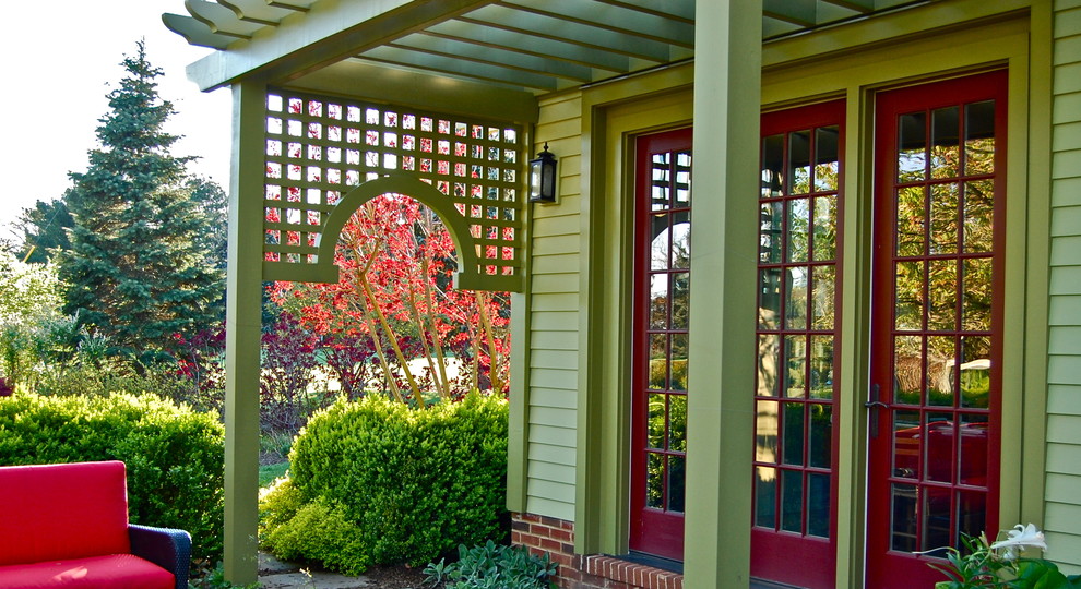 Metal Lattice Panels Spaces with Brick Covered Porch Green